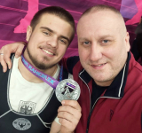 Завоевал серебряную медаль